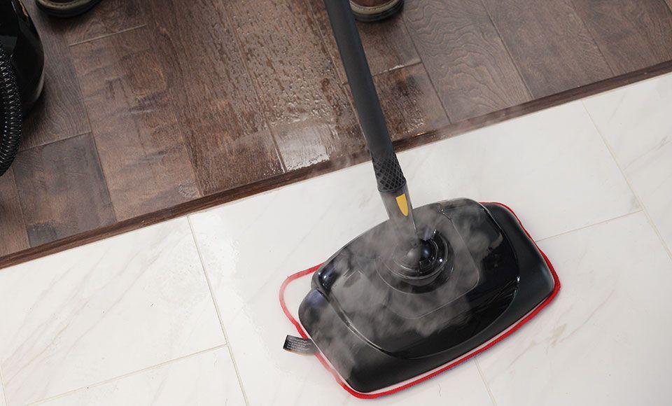 PP Mop Clean Surface Person using a Poulan Pro mop to clean a tiled floor
